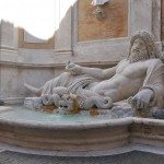 A massive statue fountain lies inside the Capitoline Museums